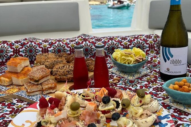 Favignana inflatable boat tour, wine tasting, snorkeling and relaxation - A local tasting on the way