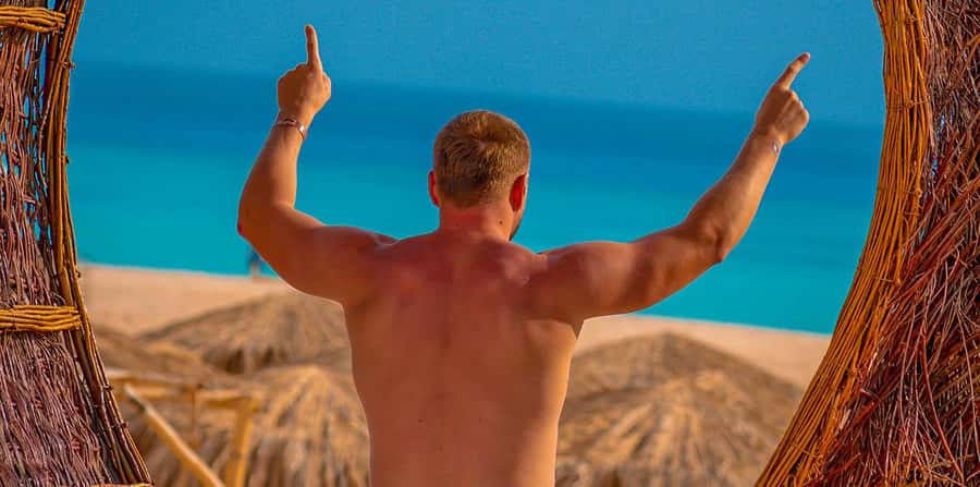 Hurghada: Hula Hula Cruise with Lunch, Massage, & Snorkeling - Beach time, lunch, and water sports