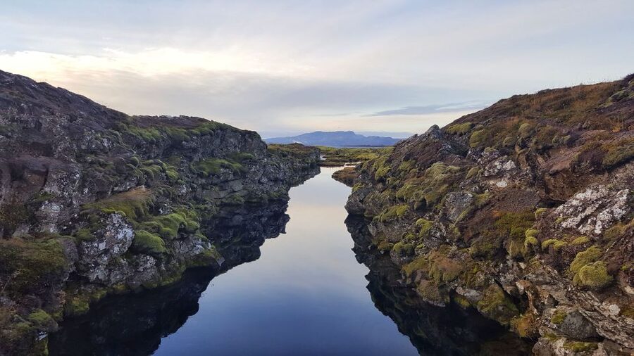 Iceland: Silfra Snorkeling Tour and Sky Lagoon Spa Combo - What the cold water feels like in a drysuit